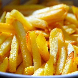 “The smell of the french fries was wafting through the air.”