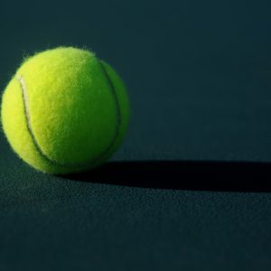“We needed to learn how to pick up the tennis ball without bending over.”
